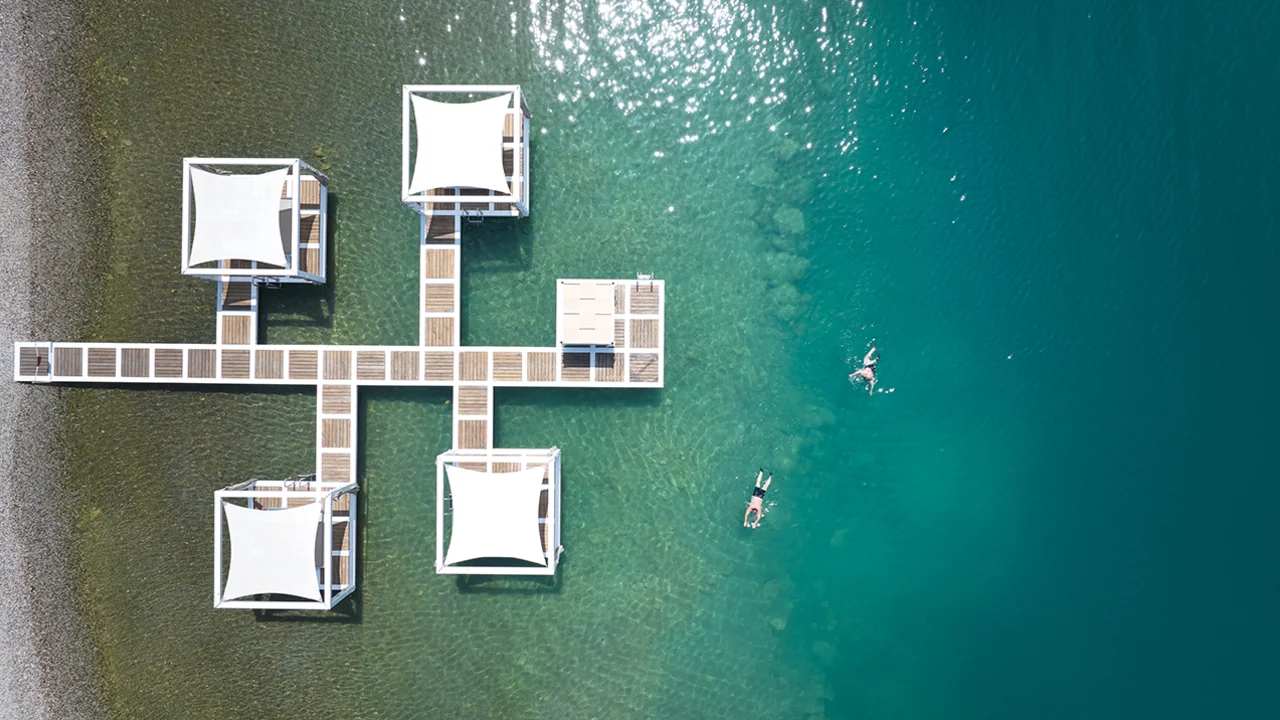 Aerial view of floating sea platforms in turquoise water