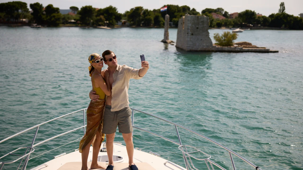 Couple enjoying a boat trip on the Adriatic Sea
