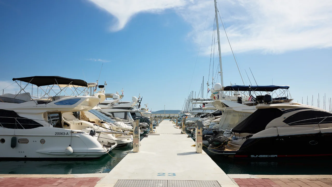 Motor yachts moored along the docks at D-Marin Dalmacija